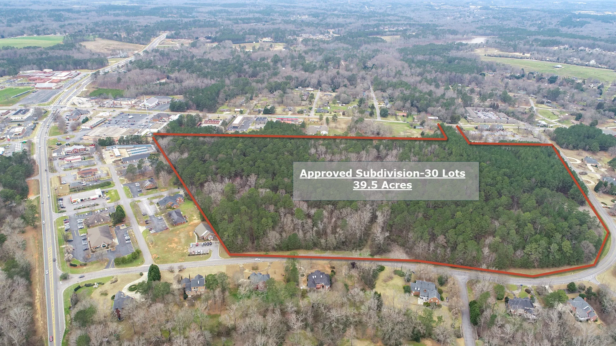 Aerial view of outlined 39.5-acre approved 30-lot residential subdivision tract
